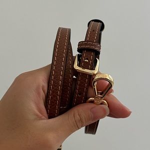 Brown leather bag straps